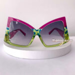 Edgy pink green butterfly geometric sunglasses