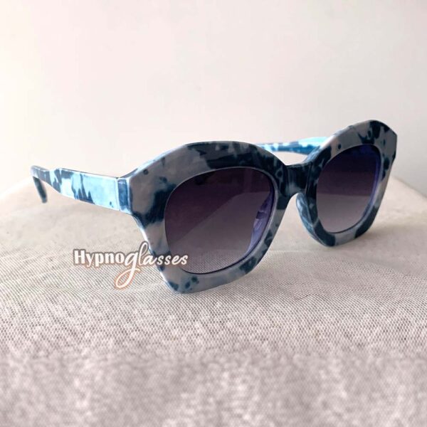 Blue marble cat eye sunglasses for women with black lenses side